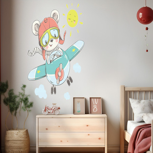 Naklejka na ścianę Misiek leci samolotem i słoneczko świeci 90 cm na 60 cm