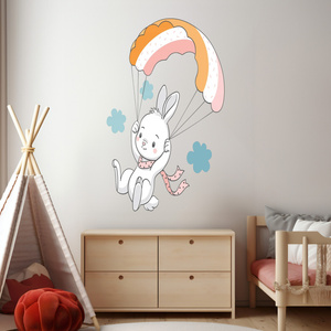 Naklejka na ścianę króliczek leci w chmurkach 90 cm na 60 cm